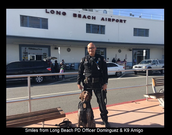 Smiles from Long Beach PD Officer Dominguez and K9 Amigo