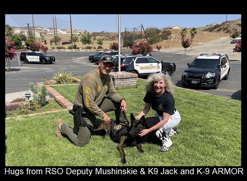 Hugs from Riverside Sheriff Deputy Mushinskie and K9 Jack wearing his K9 Armor vest with cofounder Suzanne Saunders