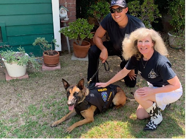 Hugs from K9 Armor cofounder Suzanne and San Bernardino PD K9 Heroes Officer Guzman and K9 Falco