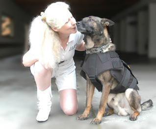 St Helena PD K9 Djino thanks Suzanne Saunders, K9 Armor Co-Founder for his bulletproof vest
					  