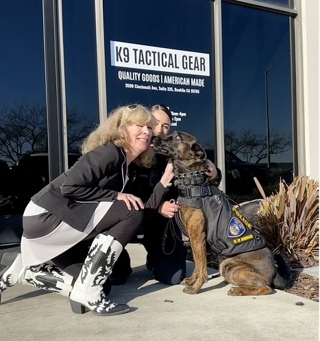 K9 kisses from Union City Police Officer Rosa Canjura and K9 Turbo